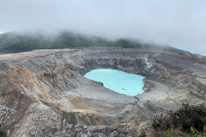 Full day Sarapiqui from San Jose Volcano Hike watch wild life and Kayaking tour