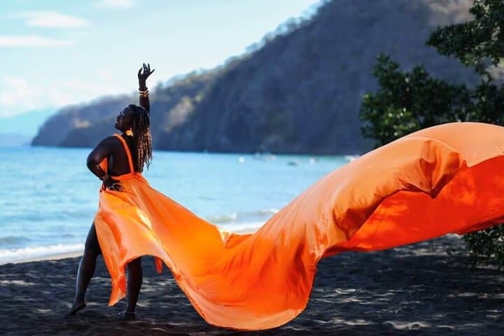 A dream flying dress photoshoot in stunning shades of orange — where movement, color, and beauty come together to create timeless memories.