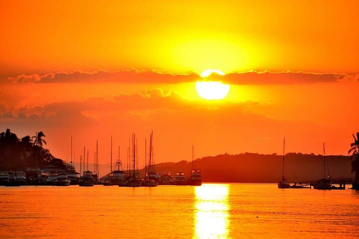 Sunset sailing on a classic sailboat in Jaco and Herradura
